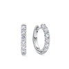 1.00ct TW Lab-Grown Diamond Huggie Earrings in Sterling Silver, photographed front on against a plain background. Each 16.3mm huggie earring features 7 individually set round lab-grown diamonds.