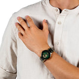 Rado Centrix Automatic Open Heart 39.5mm R30008302 worn on wrist – green gradient open heart dial, gold PVD case, gold and black ceramic bracelet, unisex 39.5mm automatic watch shown on wrist