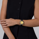 Rado Captain Cook 39mm R32223258 worn on wrist – gold glitter dial, black ceramic bezel, stainless steel case and bracelet, mid-sized 39mm automatic dive watch shown on wrist