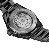 Rado Captain Cook Discover 40.7mm R32279312 caseback view – screw-down titanium caseback with transparent sapphire crystal window showing the Rado R763 automatic movement, Swiss made