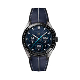 TAG Heuer Connected Calibre E5 x TaylorMade Edition SBT8A86.EB0421 shown face-on with its titanium case and digital golf-tracking display fully visible. The black and blue perforated strap is displayed straight down, secured by a titanium double-security buckle.