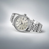Side profile of King Seiko SJE089J showing box-shaped sapphire crystal and polished stainless steel case