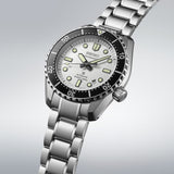 From this angle, the Seiko Prospex "Marinemaster" Automatic 42.60mm Men's Watch SLA077J shows its textured white dial, black unidirectional bezel and mixed case finishing together, showcasing the watch's heritage-inspired silhouette.