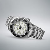 From this angle, the Seiko Prospex "Marinemaster" Automatic 42.60mm Men's Watch SLA077J shows its textured white dial, black unidirectional bezel and mixed case finishing together, showcasing the watch's heritage-inspired silhouette.