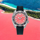 From this angle, the Seiko Prospex Automatic 45mm Limited Edition Watch SPB541J shows the coral-pink sunburst dial's glow and unidirectional bezel together with the stainless steel case and silicone strap.