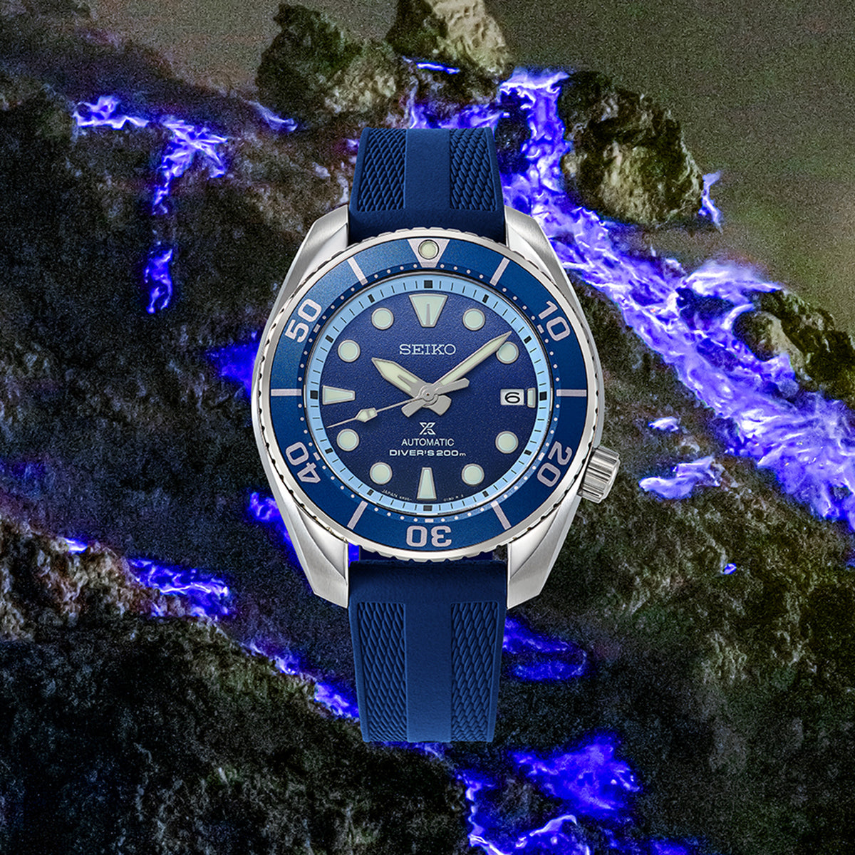 From this angle, the Seiko Prospex Automatic 45mm Limited Edition Watch SPB543J shows the deep blue sunburst dial's glow and unidirectional bezel together with the stainless steel case and silicone strap.