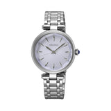 The Seiko Conceptual Quartz Women’s 30mm Watch SRZ553P has a textured light blue dial with slim baton markers. The 30mm stainless steel case has a faceted Hardlex crystal.