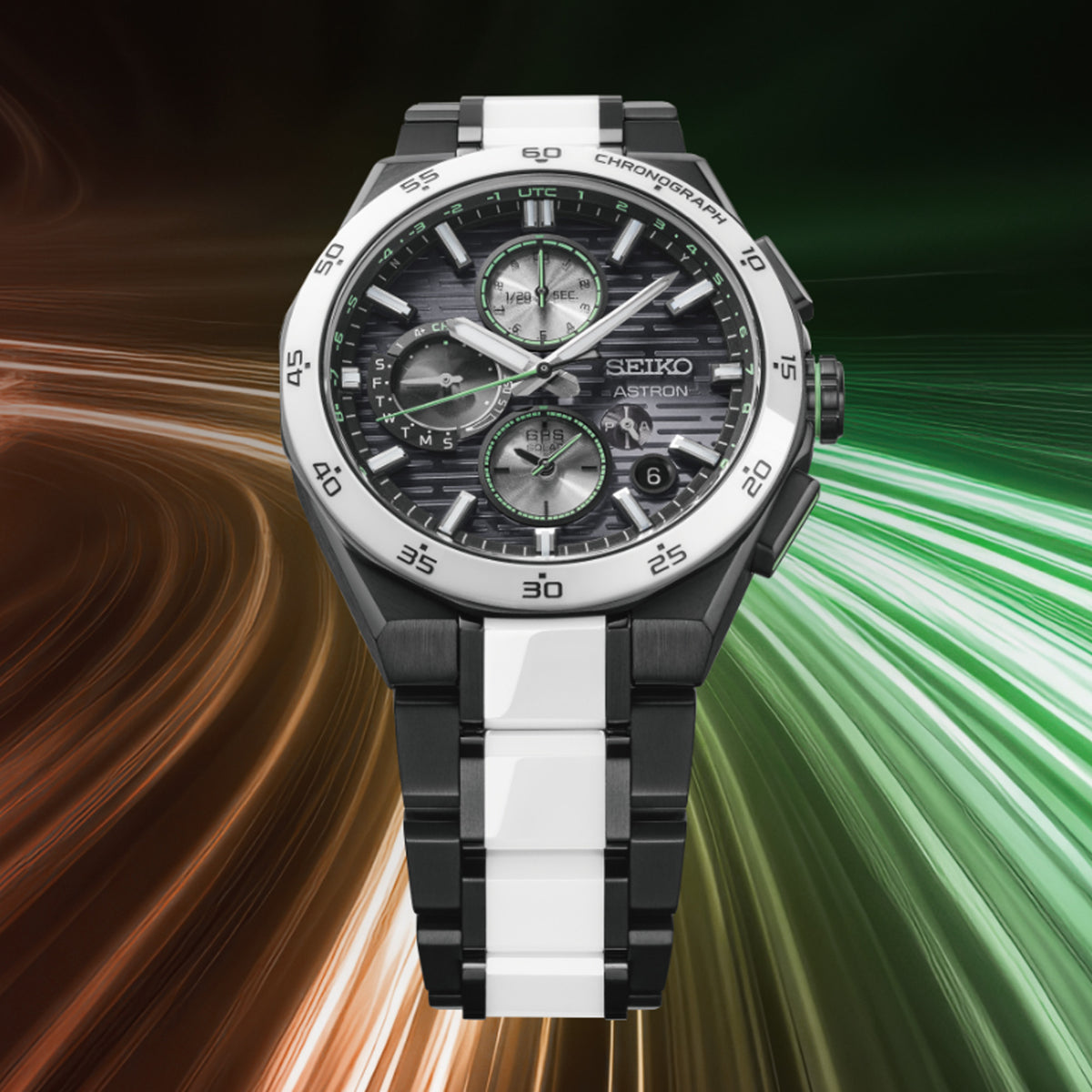 From this angle, the Seiko Astron Limited Edition Solar GPS Men's 43.40mm Watch SSH185J shows the dial's light green accents and horizontal pattern together with the black titanium and white ceramic case.