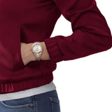 Tissot PR 100 Sport Chic 36mm T101.910.22.116.00 worn on wrist – white mother-of-pearl dial with diamond indexes, two-tone grey and rose gold PVD case and bracelet, elegant 36mm women's quartz watch shown on wrist