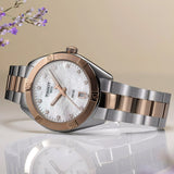 Tissot PR 100 Sport Chic 36mm T101.910.22.116.00 front view – white mother-of-pearl dial, two-tone grey and rose gold PVD stainless steel case, 12 diamond hour indexes, Super-LumiNova® hands, date window, two-tone bracelet