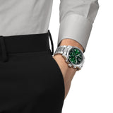 Tissot Chrono XL Quartz Chronograph men’s 42mm watch featuring a green dial, stainless steel case, chronograph subdials and matching stainless steel bracelet - on hand
