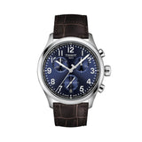 Tissot Chrono L 42mm T116.417.16.042.00 men’s chronograph watch with blue dial, stainless steel case, luminous hands, chronograph sub-dials, date display, and brown textured leather strap.