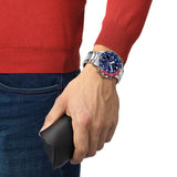 Tissot Seastar 1000 45.5mm T120.417.11.041.03 worn on wrist – blue chronograph dial, red and blue dive bezel, stainless steel mesh bracelet, bold 45.5mm quartz dive chronograph shown on wrist