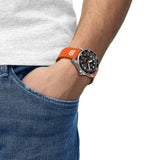 Tissot Seastar 1000 Wilson WNBA 40mm T120.807.17.051.00 worn on wrist – black dial with orange details, stainless steel case, Wilson WNBA game ball strap, bold 40mm WNBA special edition automatic shown on wrist