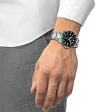 Tissot Seastar 1000 GMT 40mm T120.852.11.051.00 worn on wrist – black dial with GMT function, silver stainless steel case and bracelet, robust 40mm dive watch presence shown on wrist