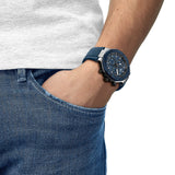 Tissot T-Race 45mm T141.417.27.041.00 worn on wrist – blue chronograph dial, black PVD case, blue silicone strap, bold 45mm sport watch presence shown on wrist