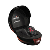 A Tissot Moto GP watch with a black and red dial, displayed inside its open black presentation box on a white background.