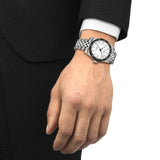 Tissot PR516 Automatic 38mm T149.407.11.031.00 front view – white dial, PVD stainless steel case, mineral bezel ring, index hour markers, date window, grey stainless steel bracelet