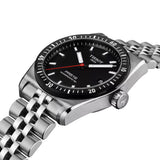 Tissot PR516 38mm T149.407.11.051.00 front view – black dial, 316L stainless steel case, mineral bezel ring with 60-minute scale, Super-LumiNova® indexes and hands, date window, stainless steel bracelet