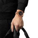 Tissot PR516 40mm T149.417.33.051.00 worn on wrist – black chronograph dial, full rose gold PVD case and bracelet, bold 40mm quartz chronograph sport watch shown on wrist