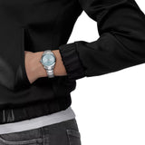 Tissot PR 100 34mm T150.210.11.351.00 worn on wrist – ice blue dial, silver stainless steel case and bracelet, elegant 34mm women's quartz watch shown on wrist
