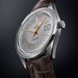 Tissot Visodate 39mm T157.407.16.031.00 front view – silver dial with gold indexes, stainless steel case, Dauphine hands, date window, brown crocodile-embossed leather strap