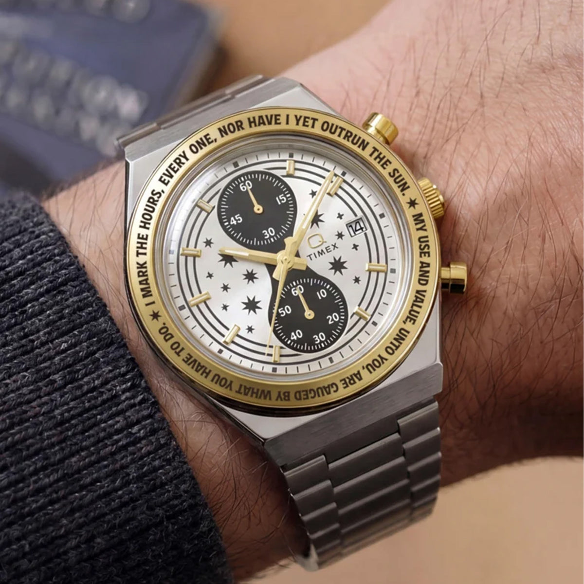 The Timex x Harry Potter Time Turner Quartz Chronograph 40mm Watch TW2Y75900 pairs its 40mm stainless steel case with a silver-tone bracelet on the wrist. The gold-tone bezel adds a warm accent to the silver finish.