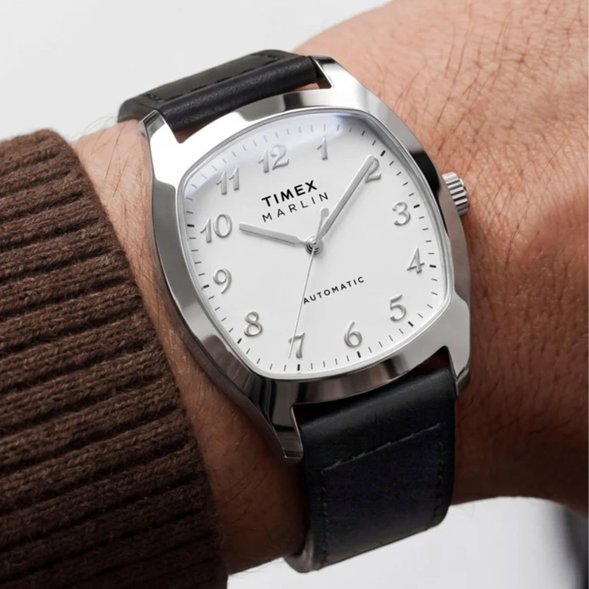 The Timex Marlin Chatham Automatic 36mm Watch TW2Y84300 pairs its compact 36mm case with a black leather strap on the wrist. The size sits comfortably on a wide range of wrists.