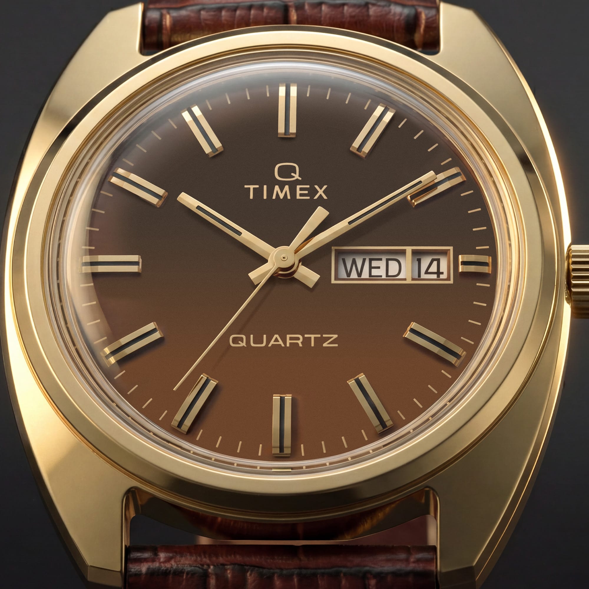 The Timex Q Timex Dress 37mm Watch TW2Y87200 makes a versatile everyday accessory, suiting both casual and dressier occasions. The brown dial and Gold PVD case bring warm, understated style to any outfit.