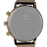 Close-up of the back of a Timex watch with a gold-tone case, dark brown leather strap, and a translucent gray protective cover over the case.