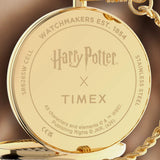 The Timex x Harry Potter Time Turner 48.5mm Pocket Watch TW2Y99600 has a case back engraved with the Harry Potter and Timex logos. A battery-powered quartz analog movement sits inside the case.