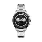 The Timex Atelier Quartz Chronograph Men's 40mm Watch TW6A06900 features a guilloché-engraved black dial with dual sub-dials, a date window, and a tachymeter scale on the top ring.