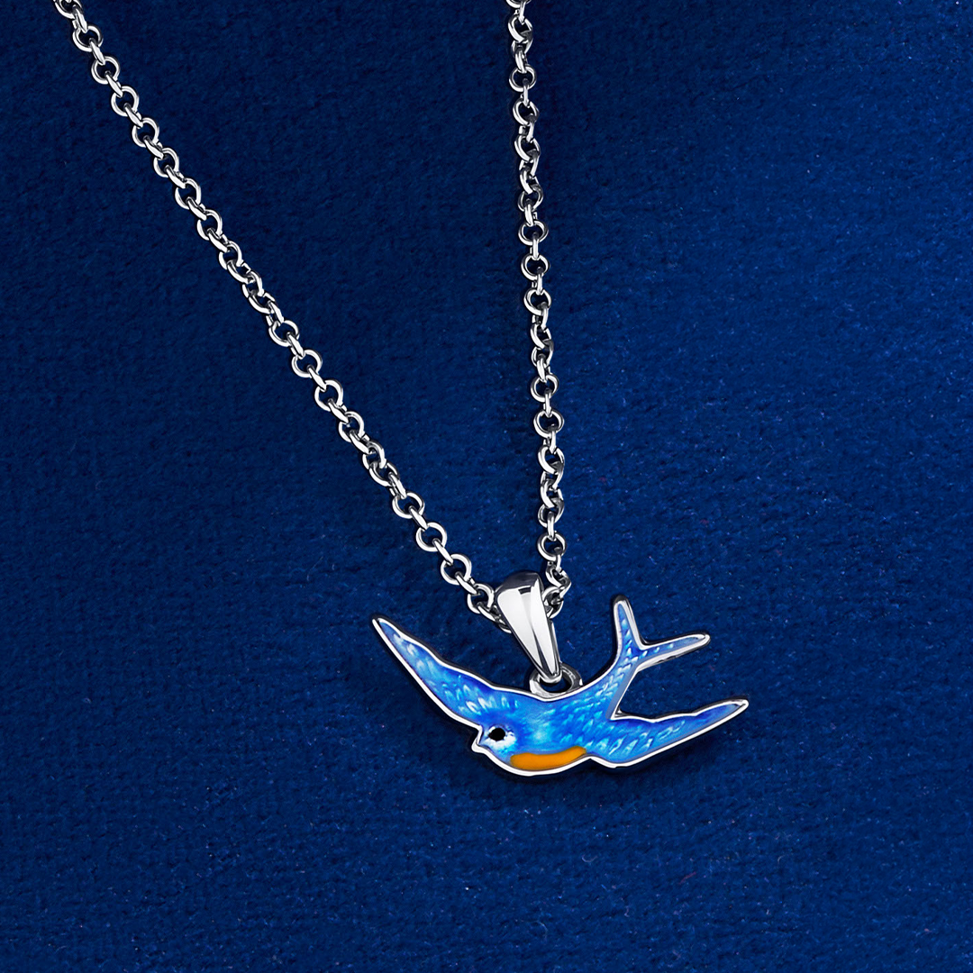 Bluebird of Happiness Pendant in Sterling Silver placed flat