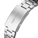 TAG Heuer Formula 1 Date WAZ2011.BA0842 photographed in close-up focusing on the steel bracelet's polished and brushed link detailing. The case is partially visible at the top of the frame, connecting to the bracelet via the lugs.