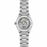 TAG Heuer Carrera Date WBN231E.BA0001 shown through the sapphire exhibition caseback, revealing the Calibre 7 automatic movement and Victory Wreath engraving. The steel bracelet is visible alongside the case-back detail.