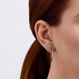 Cubic Zirconia Round Huggie Earrings in Sterling Silver