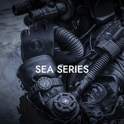 Black diving equipment and Luminox watch with 'SEA SERIES' text on a dark background