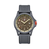 Front view of the Luminox Bear Grylls Survival Land Men's 43mm Quartz Watch XB.3716 with a sand-blasted sand-coloured dial and Bear Grylls logo at 10 o'clock. This Bear Grylls Survival Land 3710 Series watch features a lightweight ALUMI-NOX aluminium case, an orange crown and a black rubber strap.