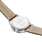 Back view of the Luminox Air Pilot P-38 Lightning Men's 42mm Quartz GMT Watch XA.9521 showing the stainless steel case back. This P-38 Lightning pilot's watch is water resistant to 100m and comes on a brown leather strap.