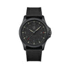 Front view of the Luminox Atacama Field Men's 43mm Quartz Watch XL.1961 with a textured black blackout dial and 12 and 24-hour numerals. This Atacama Field watch features a black CARBONOX™ case and a black rubber strap with a textile top.