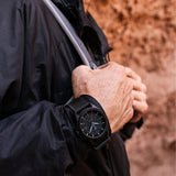 Luminox Atacama Field Men's 43mm Quartz Watch XL.1961 worn on the wrist to show its size and fit. This Atacama Field watch features a textured black dial and a lightweight black CARBONOX™ case on a black rubber strap.
