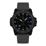 Luminox MIL-SPEC Men's 46mm Quartz Watch XL.3359.SET glowing in the dark with Luminox Light Technology. The self-powered tritium tubes on the hands and markers, plus the coated arrow tip of the orange seconds hand, keep this MIL-SPEC 3350 Series watch visible in any light.