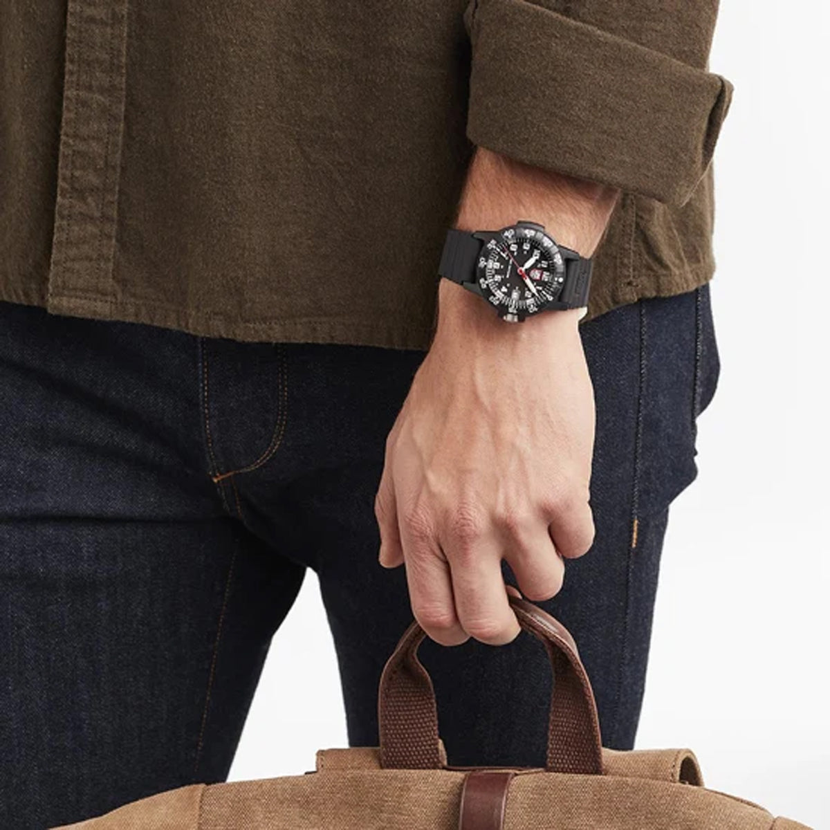 Luminox Leatherback SEA Turtle Men's 39mm Quartz Watch XS.0301.L worn on the wrist to show its size and fit. This Leatherback SEA Turtle watch features a black dial with a red seconds hand and a lightweight black CARBONOX™ case on a black strap.