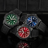 Three Luminox watches with green, blue, and red faces with Black Strap Bands
