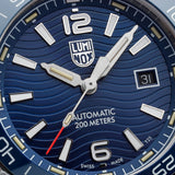 Close up of a Luminox watch case with a Dark Blue Detailed face and white accents