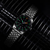 A Stainless Steel Luminox Watch with Green and Yellow Lume