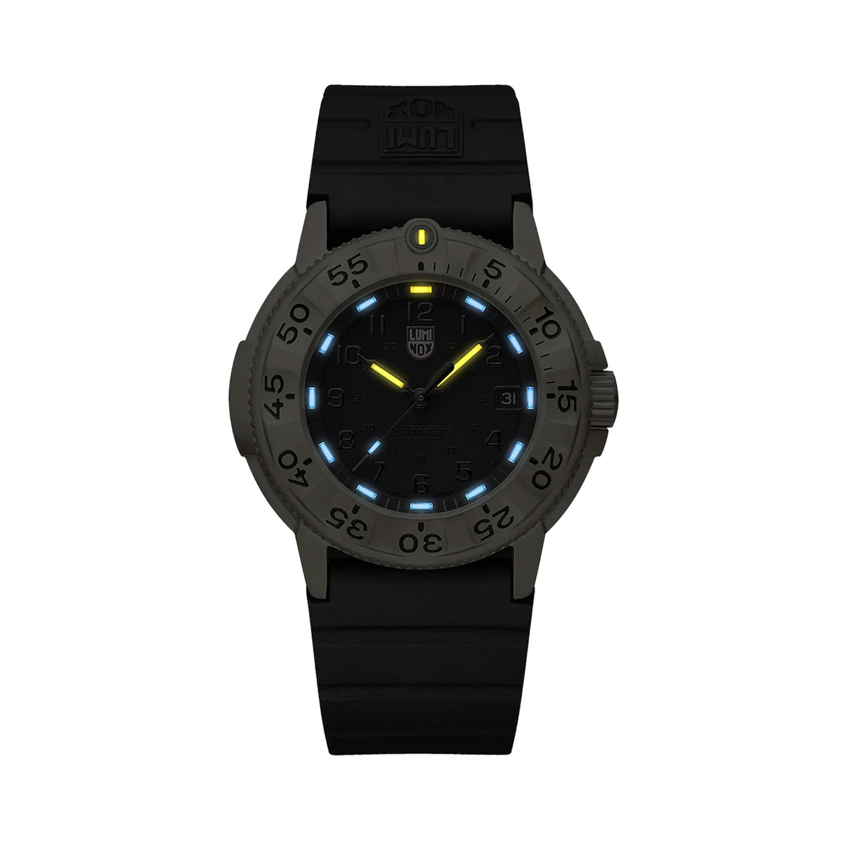 Luminox Navy SEAL Foundation Gold Color Edition Men's 43mm Quartz Watch XS.3221.NSF glowing in the dark with yellow and ice blue Luminox Light Technology. The self-powered tritium tubes on this Navy SEAL Foundation 3220 Series watch glow constantly for up to 25 years.