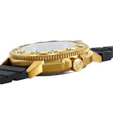 Three-quarter angle view of the Luminox Navy SEAL Foundation Gold Color Edition Men's 43mm Quartz Watch XS.3221.NSF showing the case profile and crown. This Navy SEAL Foundation 3220 Series watch pairs a gold-tone stainless steel case with a black dial under sapphire crystal.