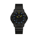 Luminox Navy SEAL Foundation Men’s 43mm Quartz Watch XS.3228.NSF glowing in the dark with ice blue and golden yellow Luminox Light Technology. The self-powered tritium tubes on this Navy SEAL Foundation 3220 Series watch glow constantly for up to 25 years.