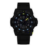 Luminox Navy SEAL Red Bull Ampol Racing Edition Men's 46mm Quartz Watch XS.3501.ARB.N glowing in the dark with Luminox Light Technology. The self-powered tritium tubes on the hands and markers of this limited edition Navy SEAL 3500 Series watch glow constantly for up to 25 years.